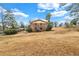 Two-story brick building on a large lot with scattered trees and shrubbery at 3354 Wakefield Dr, Decatur, GA 30034