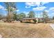 Charming single-story home with a welcoming front porch and well-maintained landscaping at 3354 Wakefield Dr, Decatur, GA 30034