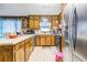 Well-maintained kitchen featuring wood cabinets, ample counter space, and stainless steel appliances at 3354 Wakefield Dr, Decatur, GA 30034