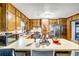 Functional kitchen with wood cabinets, a breakfast bar, stainless steel refrigerator, and generous counter space at 3354 Wakefield Dr, Decatur, GA 30034