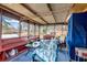 Relaxing screened-in porch with comfortable seating and a glimpse of the neighborhood at 3354 Wakefield Dr, Decatur, GA 30034