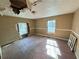 Bedroom in need of repair featuring two large windows for lots of natural light and spacious floor plan at 8859 Thomas Rd, Jonesboro, GA 30238