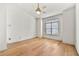 Bedroom featuring hardwood floors, ceiling fan and a window for plenty of natural light at 406 Vinings Forest Se Cir, Smyrna, GA 30080