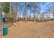 Community dog park featuring wood chip ground cover and seating at 406 Vinings Forest Se Cir, Smyrna, GA 30080