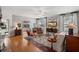 Cozy living room featuring hardwood floors, comfortable seating, and natural lighting at 164 Owens Farm Ln, Woodstock, GA 30188