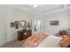 Neutral main bedroom with plush carpet and classic furniture throughout, with an ensuite bathroom at 164 Owens Farm Ln, Woodstock, GA 30188