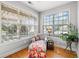 Bright sunroom with large windows offering plenty of natural light at 164 Owens Farm Ln, Woodstock, GA 30188