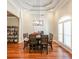 Beautiful dining room featuring hardwood floors, decorative lighting, and large window at 3410 Church Rd, Villa Rica, GA 30180