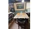 Dining room with a vintage ceiling fan and a large wooden table at 5435 Hearn Rd, Ellenwood, GA 30294