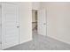 This bedroom has neutral walls and gray carpet at 3848 Pressley Ln # 26, Powder Springs, GA 30127