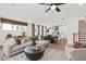 Bright open living space leading into the kitchen and featuring hardwood floors at 5760 Tillman Way, Powder Springs, GA 30127
