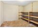 Unfinished basement area featuring shelving at 3113 Melissa Ct, Douglasville, GA 30135