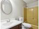 Cozy bathroom with classic vanity and tub/shower combo at 3113 Melissa Ct, Douglasville, GA 30135