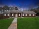 Charming single-story brick home featuring a well-manicured lawn and a classic design at 3113 Melissa Ct, Douglasville, GA 30135
