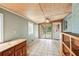 Relaxing sunroom featuring tiled flooring, exposed wood ceiling, and ample natural light at 3113 Melissa Ct, Douglasville, GA 30135