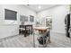 Kitchen with breakfast nook, butcher block island and pantry access at 557 Loth Wages Rd, Dacula, GA 30019