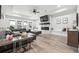 Cozy living room with fireplace, built-ins, and ample natural light at 557 Loth Wages Rd, Dacula, GA 30019