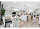 Open concept living space with dining area, kitchen and living room at 557 Loth Wages Rd, Dacula, GA 30019
