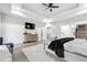 Main bedroom featuring wood floors, recessed lighting, and accent furniture at 557 Loth Wages Rd, Dacula, GA 30019