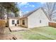 Backyard with wooden deck and partial fence at 11765 Fairway Overlook, Fayetteville, GA 30215