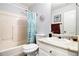 Bathroom with tub, shower, toilet and vanity at 11765 Fairway Overlook, Fayetteville, GA 30215