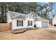 Charming single-Gathering home with a well-maintained lawn and attached garage at 11765 Fairway Overlook, Fayetteville, GA 30215
