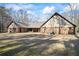Brick home featuring an expansive backyard and patio space with ample room for outdoor living at 3000 Cathedral Pl, Decatur, GA 30034