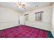 Bedroom featuring windows, patterned rug, and ample natural light at 3000 Cathedral Pl, Decatur, GA 30034