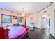 Open bedroom featuring a round bed, black tiled floors, and custom paint at 3000 Cathedral Pl, Decatur, GA 30034