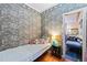 Bedroom showcases themed wallpaper and gleaming wood floors at 3000 Cathedral Pl, Decatur, GA 30034