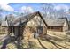 Brick home with a gable roof, a large yard and mature trees offering plenty of shade at 3000 Cathedral Pl, Decatur, GA 30034