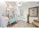 Bright foyer showcasing tile flooring, elegant decor, and view into other rooms at 3000 Cathedral Pl, Decatur, GA 30034