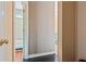 Hallway with neutral wall colors leading to bedroom and bathroom at 3000 Cathedral Pl, Decatur, GA 30034