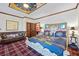 Ornate main bedroom with a decorative bed, ceiling art, and elegant furnishings at 3000 Cathedral Pl, Decatur, GA 30034