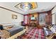 Luxurious main bedroom featuring a fireplace, unique ceiling art, and decorative furnishings at 3000 Cathedral Pl, Decatur, GA 30034
