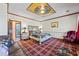 Spacious main bedroom featuring ceiling art, decorative furnishings, and carpeted floors at 3000 Cathedral Pl, Decatur, GA 30034