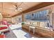 Covered back patio featuring a ceiling fan, brick accents, and a view of the backyard at 3000 Cathedral Pl, Decatur, GA 30034