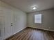 Cozy bedroom with a large closet and laminate flooring at 104 Westland Sw Ct, Marietta, GA 30064