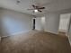 Bedroom featuring neutral walls and plush carpet, with views of a bathroom with a tub and shower at 104 Westland Sw Ct, Marietta, GA 30064