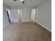 Bedroom featuring neutral walls and plush carpet, with views of a walk-in closet and bathroom at 104 Westland Sw Ct, Marietta, GA 30064