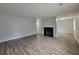 Bright living room featuring a fireplace and beautiful laminate flooring at 104 Westland Sw Ct, Marietta, GA 30064