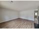 Bright living room featuring a fireplace and beautiful laminate flooring at 104 Westland Sw Ct, Marietta, GA 30064