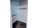 A walk in closet features carpet and white shelving at 11006 Clearwater Dr, Hampton, GA 30228