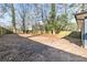 Large, level backyard with a wood fence at 1889 Cannon St, Decatur, GA 30032