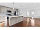 Modern kitchen with stainless steel appliances, kitchen island, and pendant lighting at 1889 Cannon St, Decatur, GA 30032