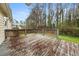 Spacious wooden backyard deck with a wooden lattice railing at 72 Diane Ct, Dallas, GA 30157