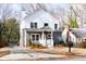 Charming two-story home with manicured lawn, driveway, and front porch at 1467 Lockwood Sw Dr, Atlanta, GA 30311