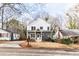 Beautiful two story home with a manicured front lawn and paved driveway at 1467 Lockwood Sw Dr, Atlanta, GA 30311