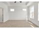 Bright and airy main bedroom featuring tray ceiling and large windows for ample natural light at 2360 Elgar Park Pl # 99, Duluth, GA 30096