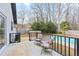 Back patio with a view of the fenced backyard and swimming pool, ideal for outdoor entertaining at 2720 Creekview Nw Pt, Marietta, GA 30064